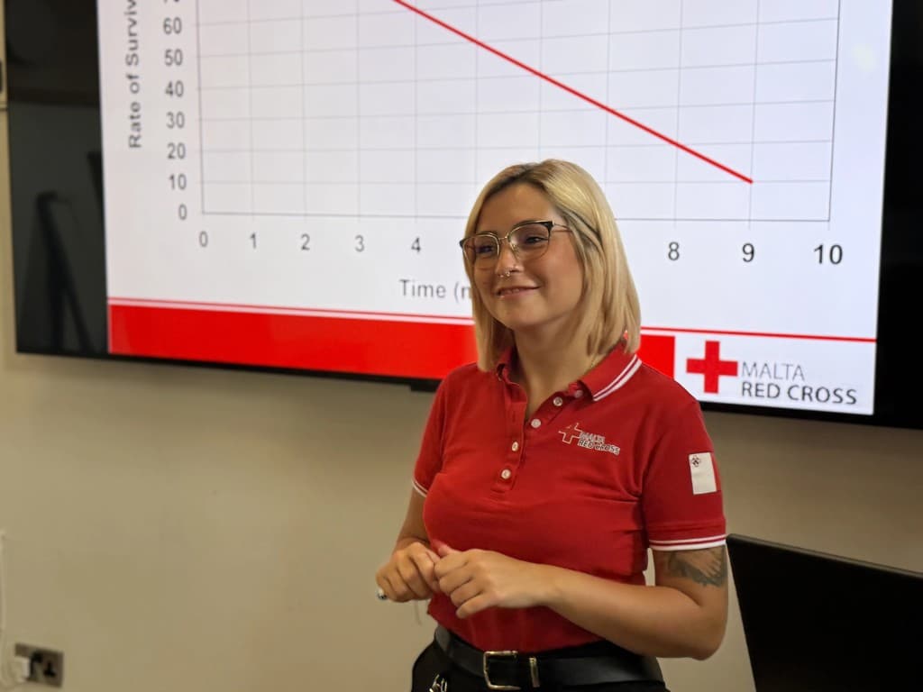 Malta Red Cross instructor presenting first aid training material