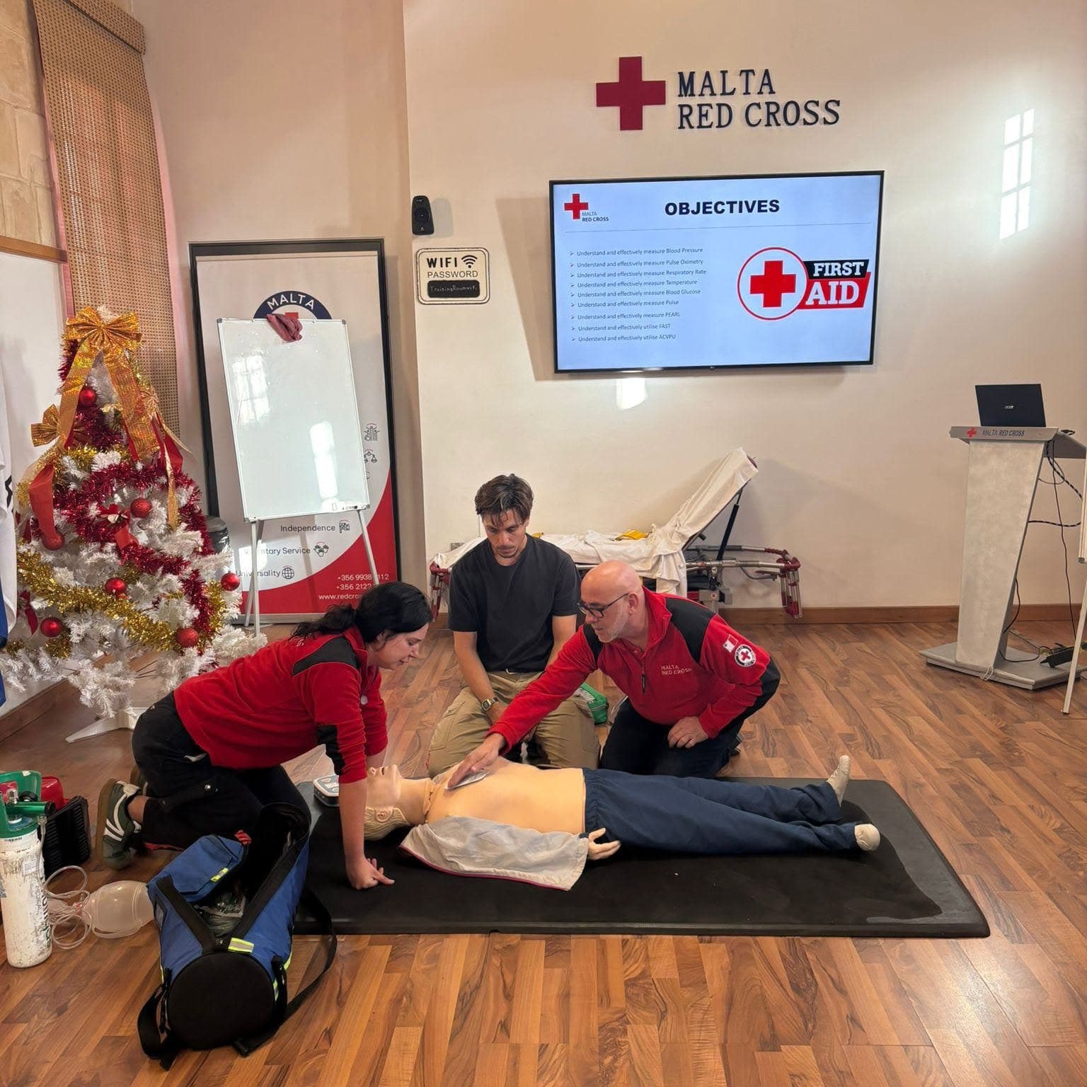 Malta Red Cross first aid training classroom with instructor and CPR mannequin