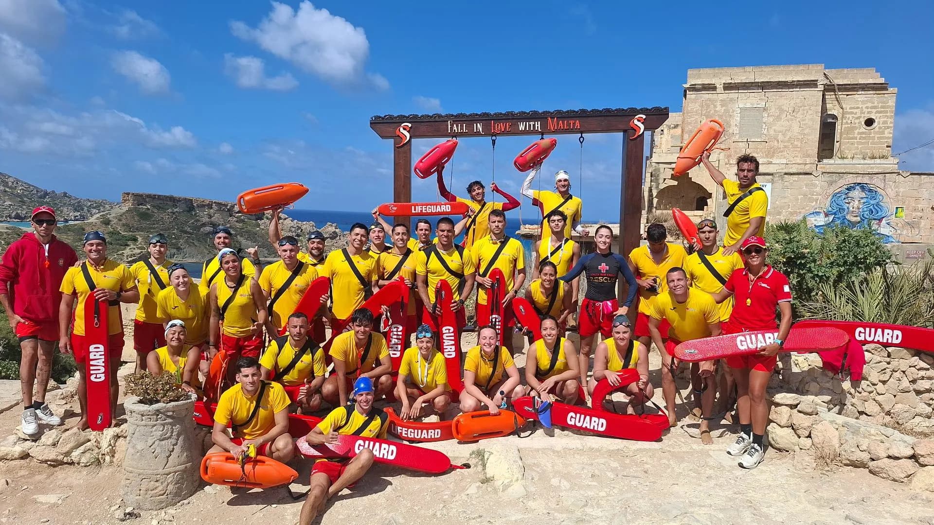 Malta Red Cross lifeguard team with rescue equipment on the coast